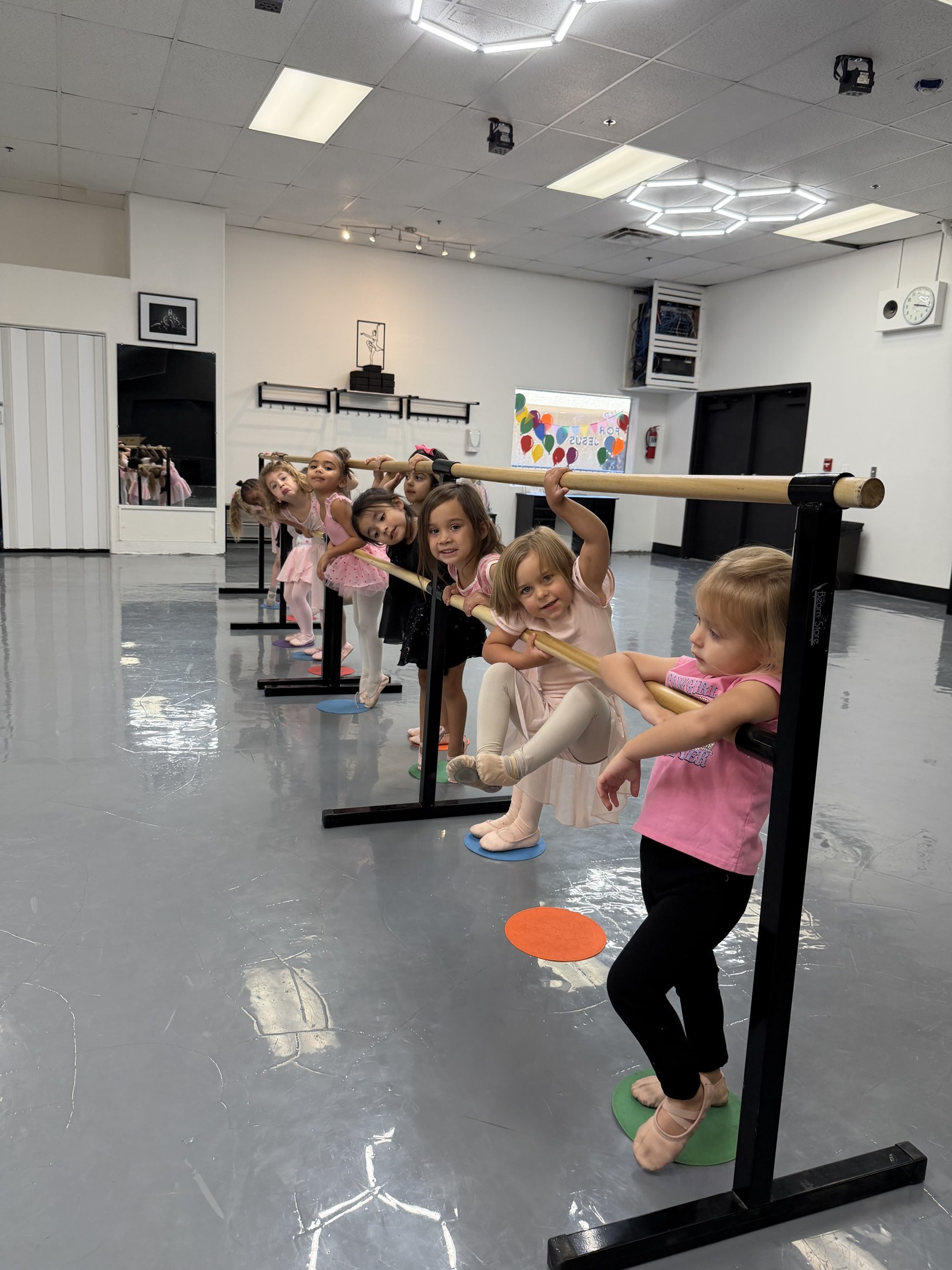Arise dancers practicing jazz movement