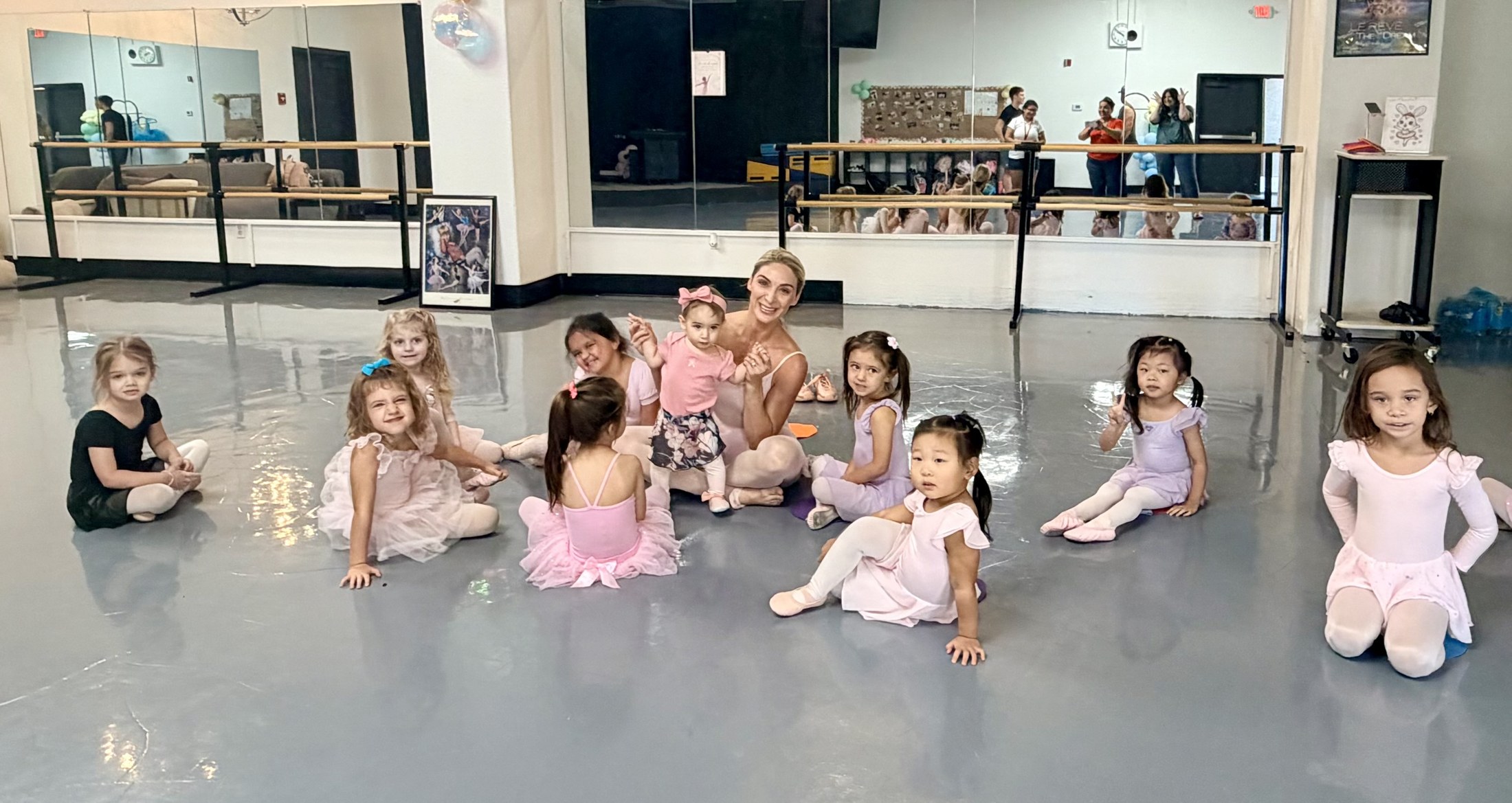 Dancers and families gathered together at the studio